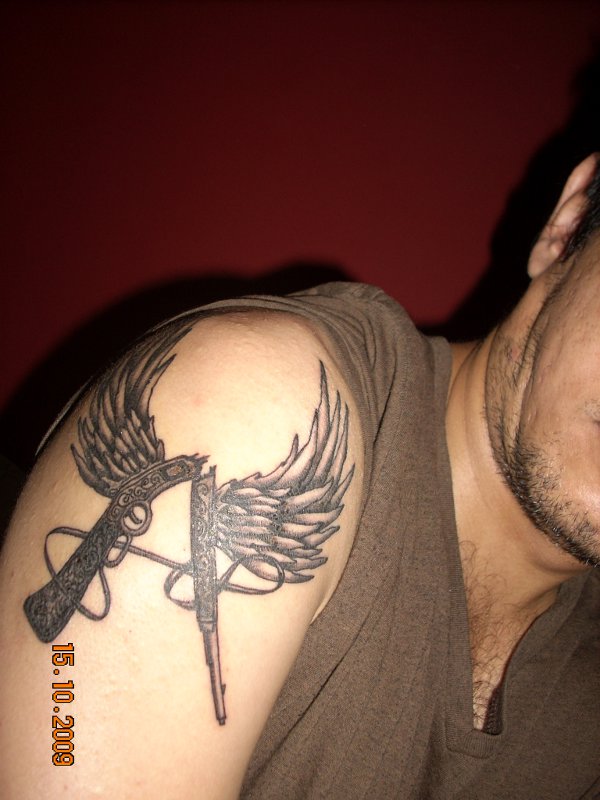 Abhishek - Winged rifle A tattoo photo