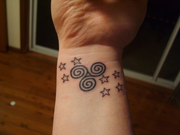 Amiee - Triskell and stars tattoo photo