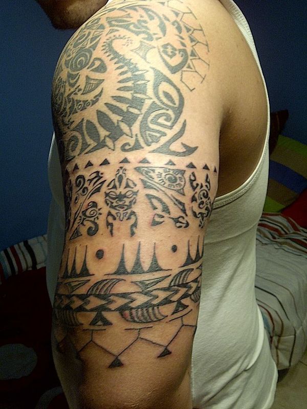 Emile - Polynesian arm tattoo