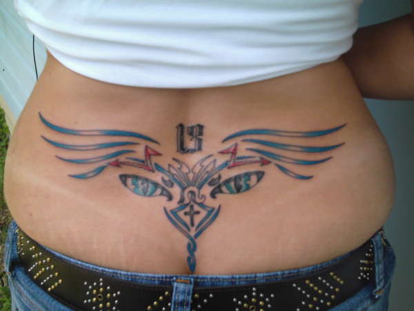 Felicia - winged lowerback tattoo photo