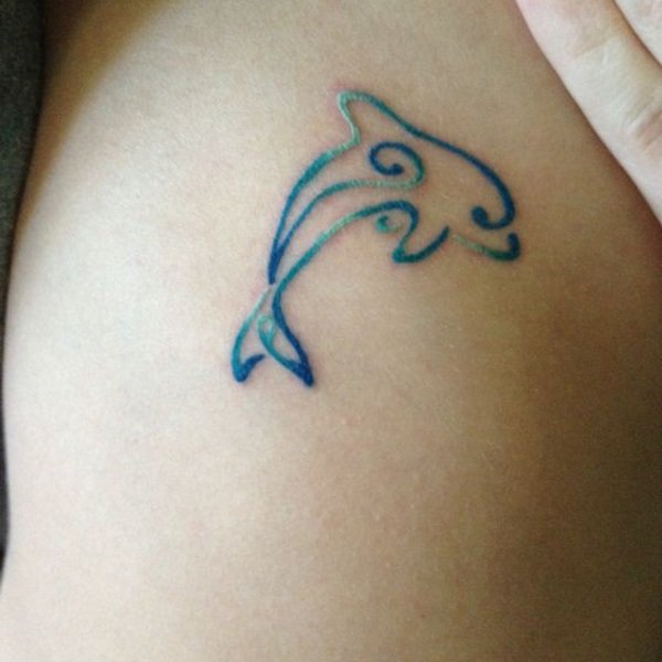 Guest - stylized dolphin tattoo