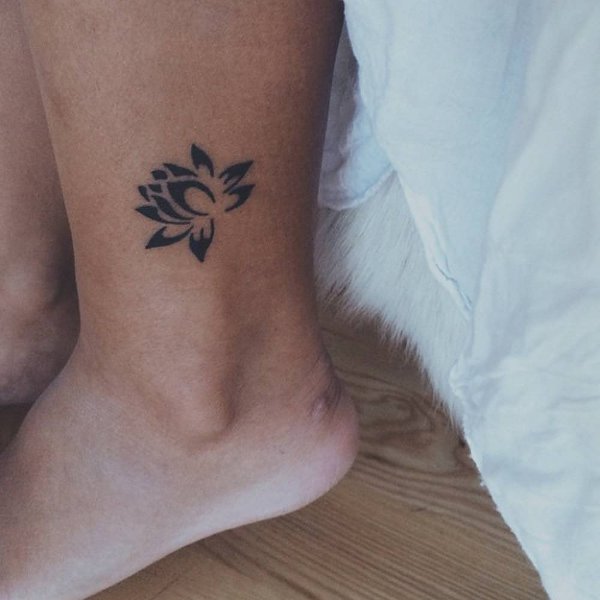 Guest - Lotus flower tattoo