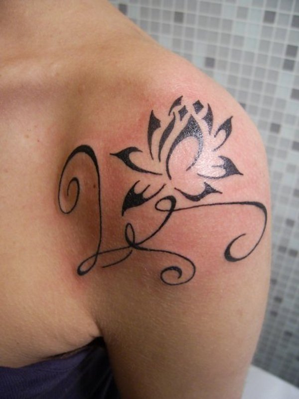 Monica - V+F lotus flower tattoo photo