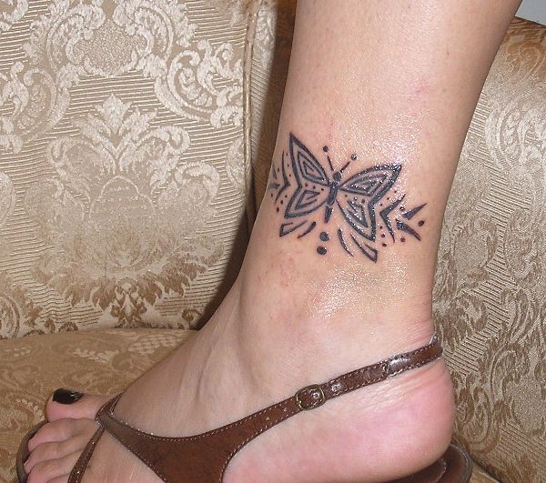 Noemi - Butterfly tattoo photo