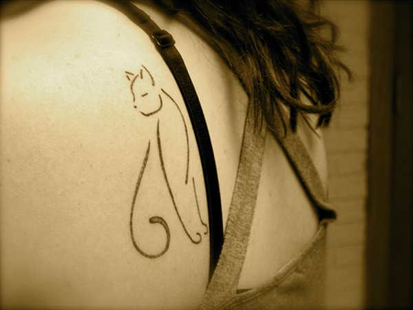 Snoopy - Stylized cat tattoo photo